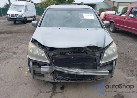 2010 Honda Odyssey Ex-L z USA, uszkodzony, nr VIN 5FNRL3H75AB057282